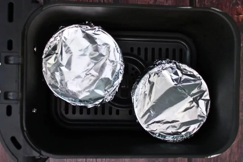 air fryer basket with loose foil cover