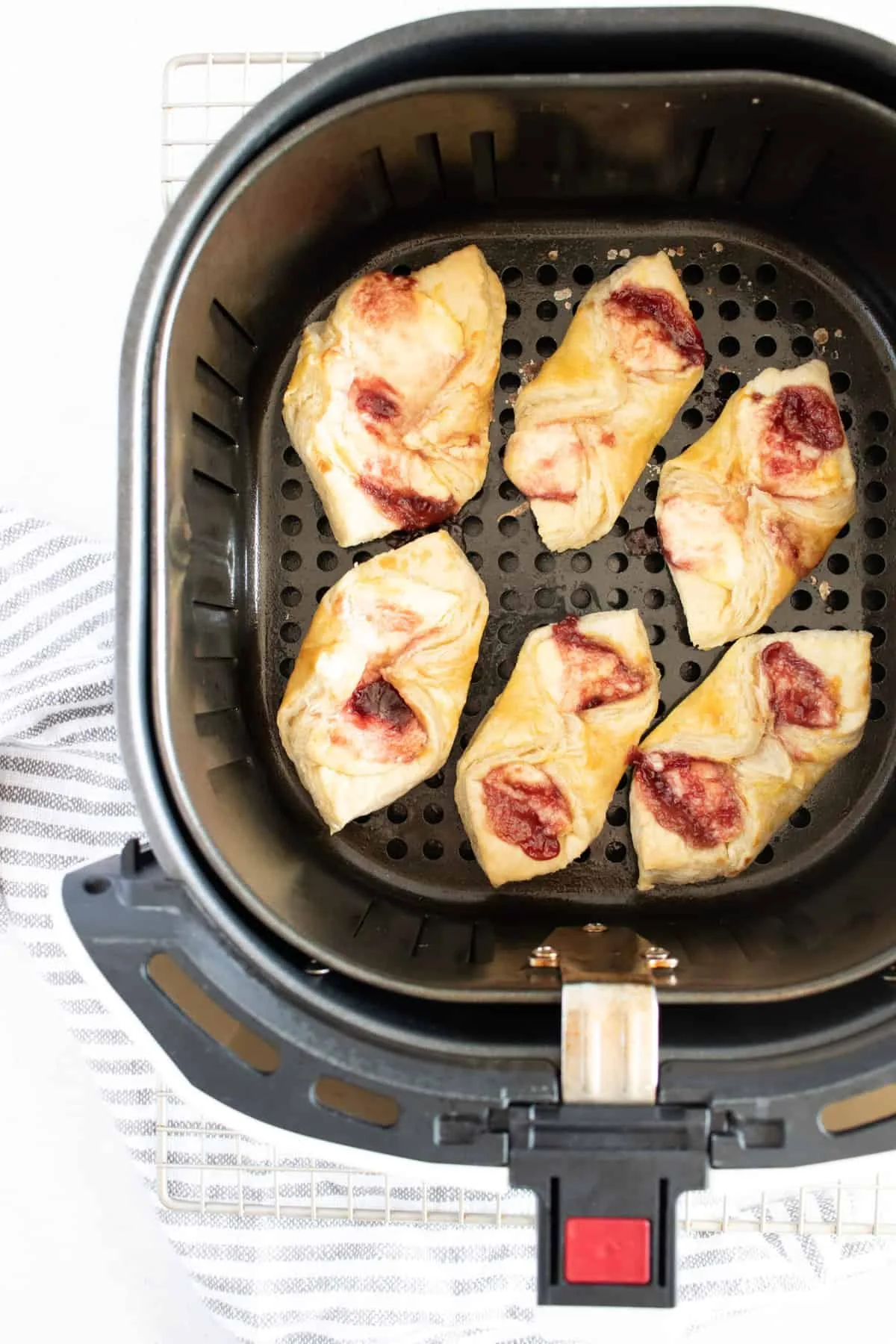 Arranging pastry in the air fryer basket