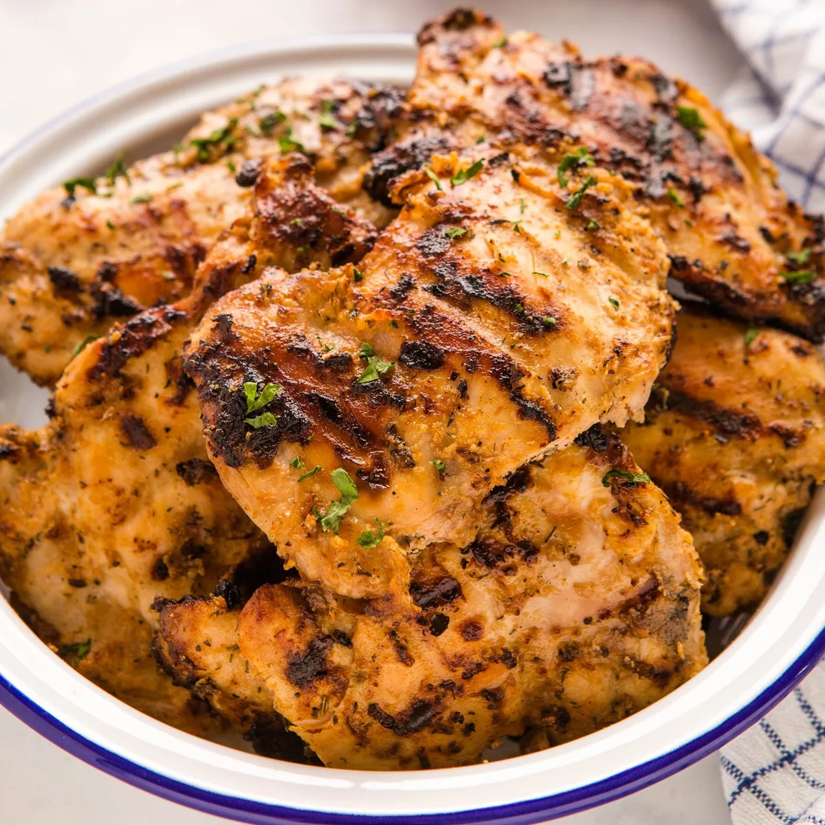 chicken thighs marinating