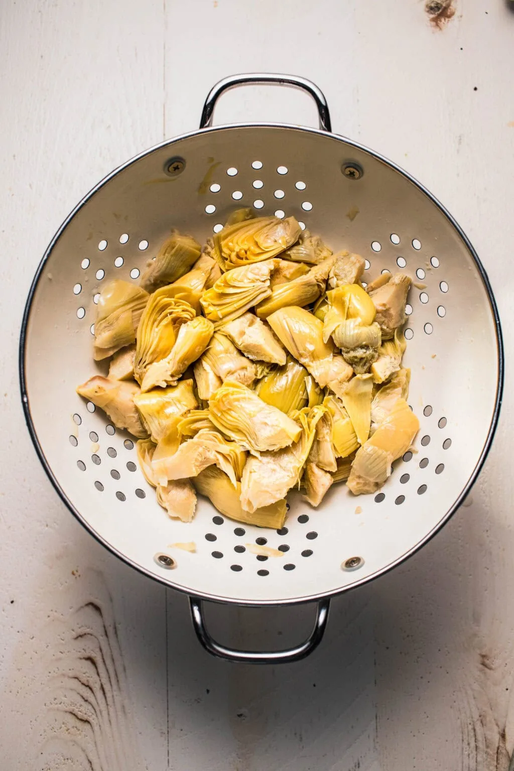 draining artichoke hearts