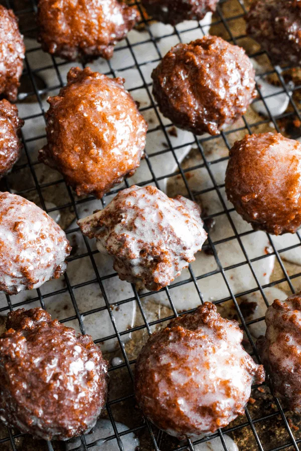 glazed donut holes on cooling rack