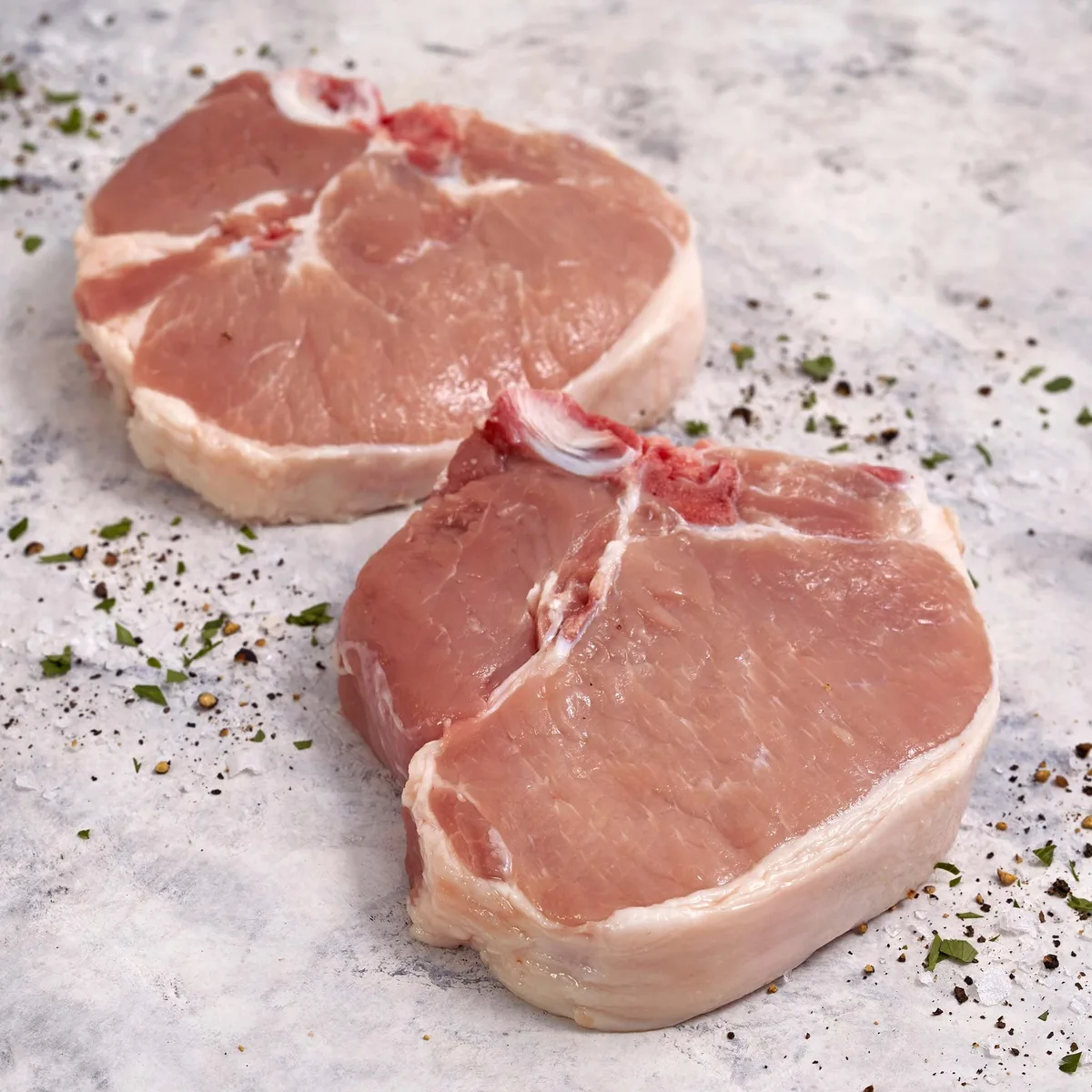 raw bone-in pork chops