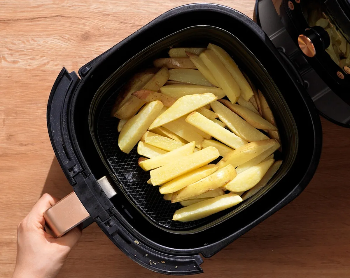 shaking air fryer basket halfway cooking