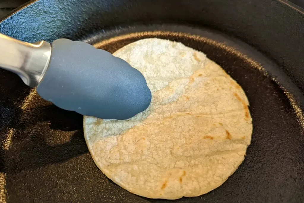 toasting corn tortillas