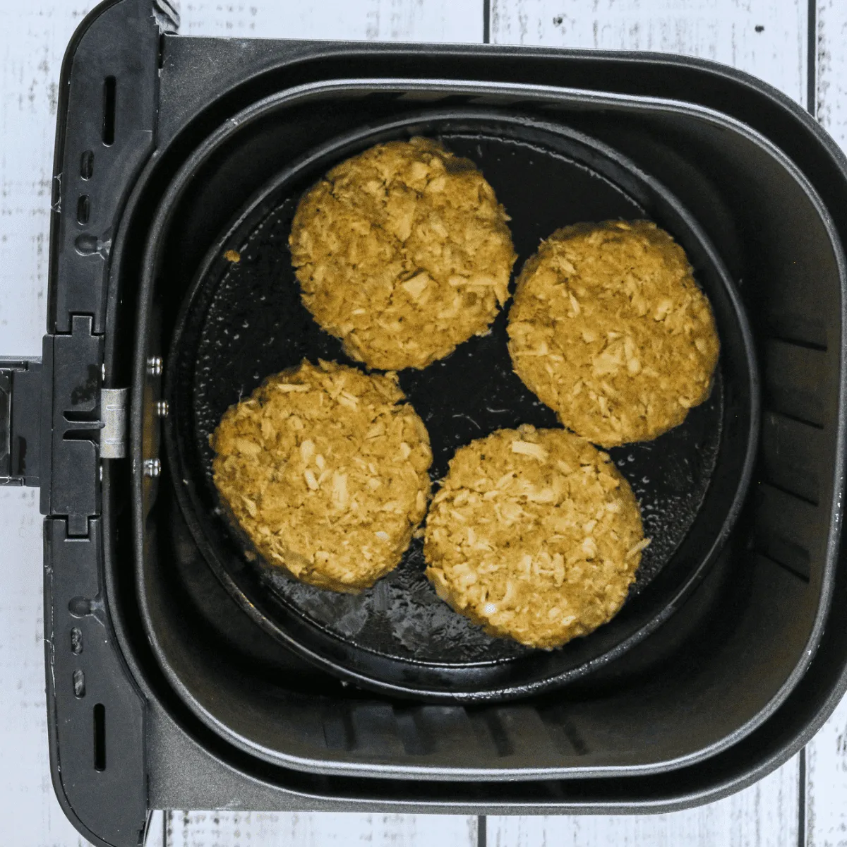 tuna patties in air fryer basket